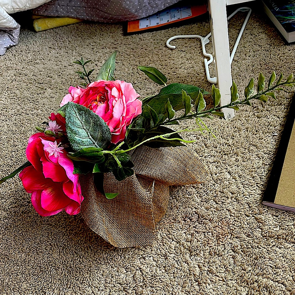 This is a plastic flower decor from Michals.